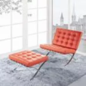 Кресло с оттоманкой в красной коже для отдыха